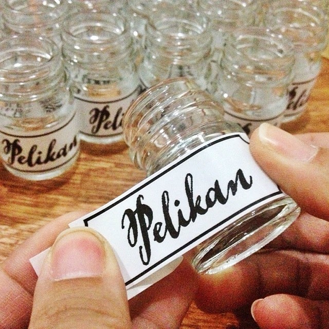 A closeup of Pelikan jar label stickers by katrina.alana of Flickr