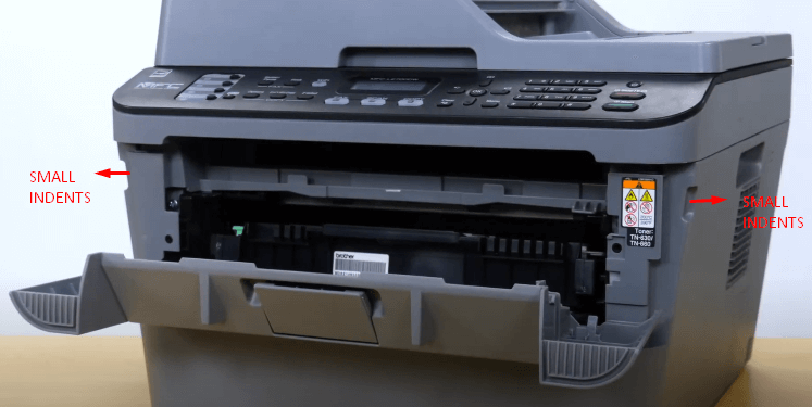 small indents on printer paper output tray